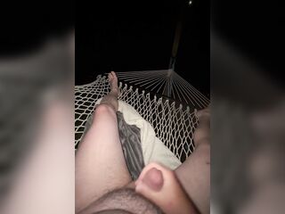 Masturbating outdoors in hammock during lightning storm