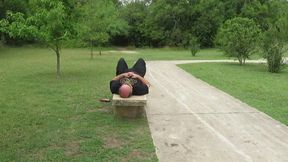 Park bench face sitting in my pink lace