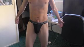 Athletic Stud With Big Cock Tries On Thong