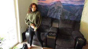 slow strip tease out of a sweater and jeans