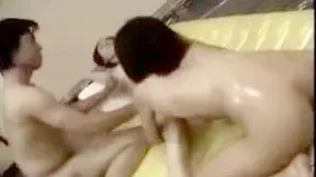 Horny girls oil up naughty Japanse girl in Hong Kong