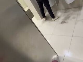 Secretly cum behind straight guys in public toilet