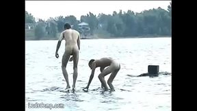 Steamy gay sex on the lake shore