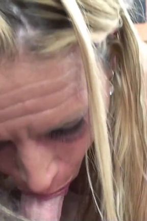 Busty MILF slut gives handjob and blowjob