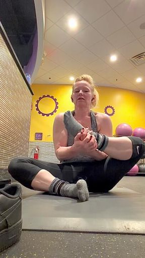 Shoe strip to steamy pink foot soles after gym muscle workout