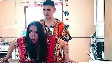 The stepmother is fucked from behind in the kitchen