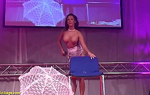 busty Milf masturbating on stage