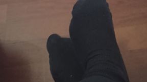 Piedi con calzini neri