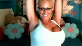 Magnificent and sophisticated blonde bimbo flashes her enormous tits