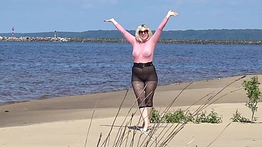 Funny milf with nylon ass and tits on beach