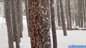 Redhead with tattoos enjoys a snowy naked moment