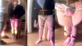 pee desperation: tied up by his flatmate, this guy tries to resist while his cock and balls are played with. he gets a boner and finally wets himself