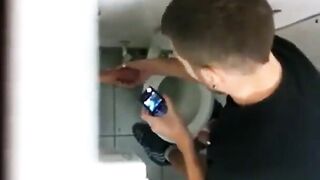 Watch this hot guy jerk off in public toilet & get a cumshot