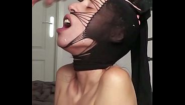 I grabbed Candie Cross'_s stocking, stretched it over her head, ripped it open for access