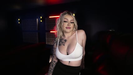 Busty Tattoo Blonde Bounces On BBC