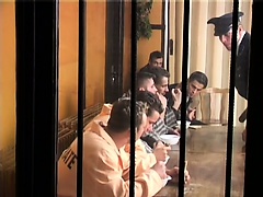 Gay fetish scene with guards and prisoners eating meat and fucking ass