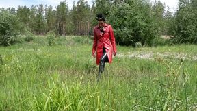 Hotty in high heels over knee boots and full leather outfit walks through a swamp and mud