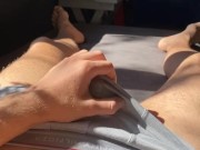 Lubing up my cock and fucking my pocket pussy while enjoying the sunshine ending with a nice load 😈