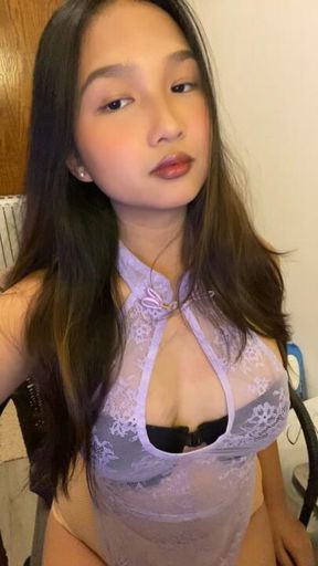 This petite cutie is wearing a lingerie