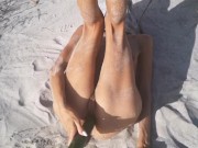 Tight Pussy takes a Hot Golden Shower while being Penetrated by a Cucumber on the Beach