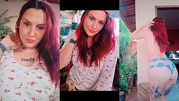 Ruiva tatuada se exibindo