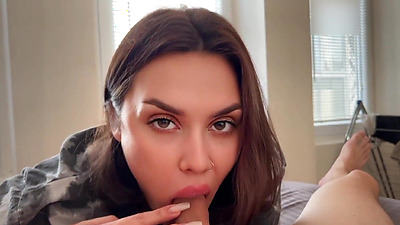 A brunette with a big booty gets up doggy style and passionately sucks penis