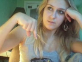 Cute blonde college girl is bored on webcam in her dorm room