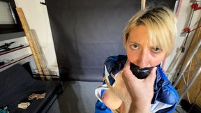 Myxxxy bound and gagged in shiny nylon Shorts and a Windbreaker