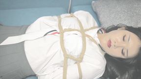 Bound Brunette Battles Bondage
