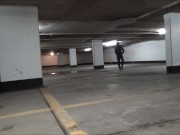 wetsuited & masked in parking garage