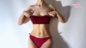 A student in oil plays with a sex toy. Fetish in oil