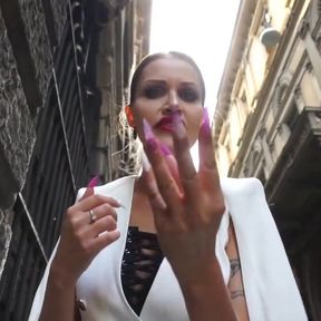 Gorgeous femdom girl punishing him outdoor