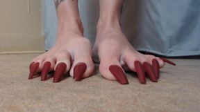 Clicking tapping long toe nails