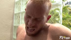 Muscular guy gets his big cock sucked by brunette man after showering