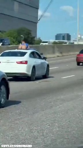 Man driving car on highway