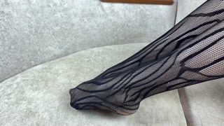 My girlfriend loves to caress her legs in black pantyhose and do handjob