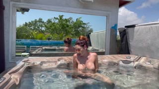 Artemisia Love jerks off naked in the jacuzzi