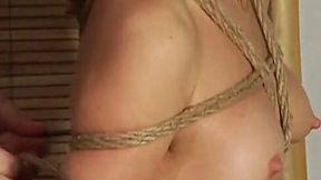 A guy with a rag on his face ties up hot petite milf lady