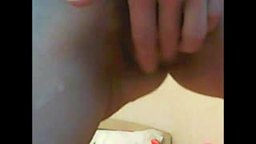 Sarah Nicole Strips and Puts on Black Stockings