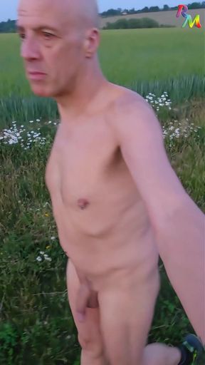 Got horny, stopped car, naked walk, wank at rear of car... almost caught!