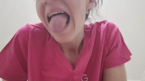 The wide-open mouth devours the small jellies