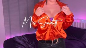 Scarlett's orange satin blouse and leather pants tease