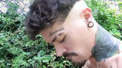 Two tattooed guys give each other blowjobs and fuck by the outdoor pool