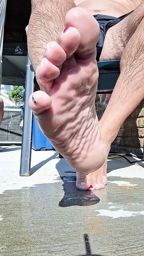 Showing off my wet feet and hairy legs