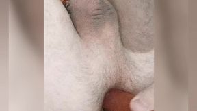 so hot twink enjoys a big anal ball and cums from a strap-on. his anal spits natural lube