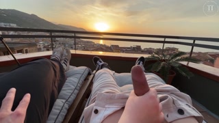 Horny handjob at sunset with a view over the bay