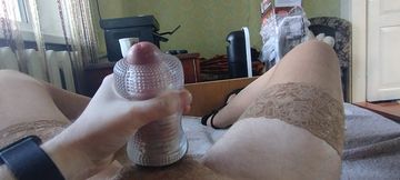 Man in pantyhose and heels having fun