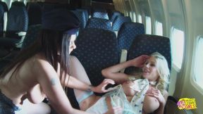 Two Naughty Flight Attendants Show Their Pussies to Each Other and Bang with a Dildo