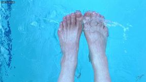 dipping my toes in the pool and splashing pov