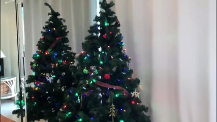 Stepmom gets stuck in the Christmas tree and fucked